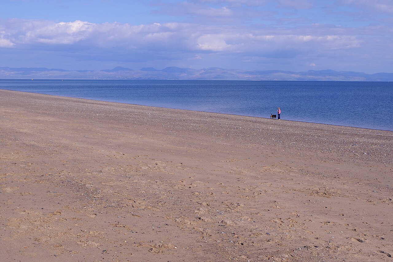The long beach at Pwllheli looking across Cardigan Bay