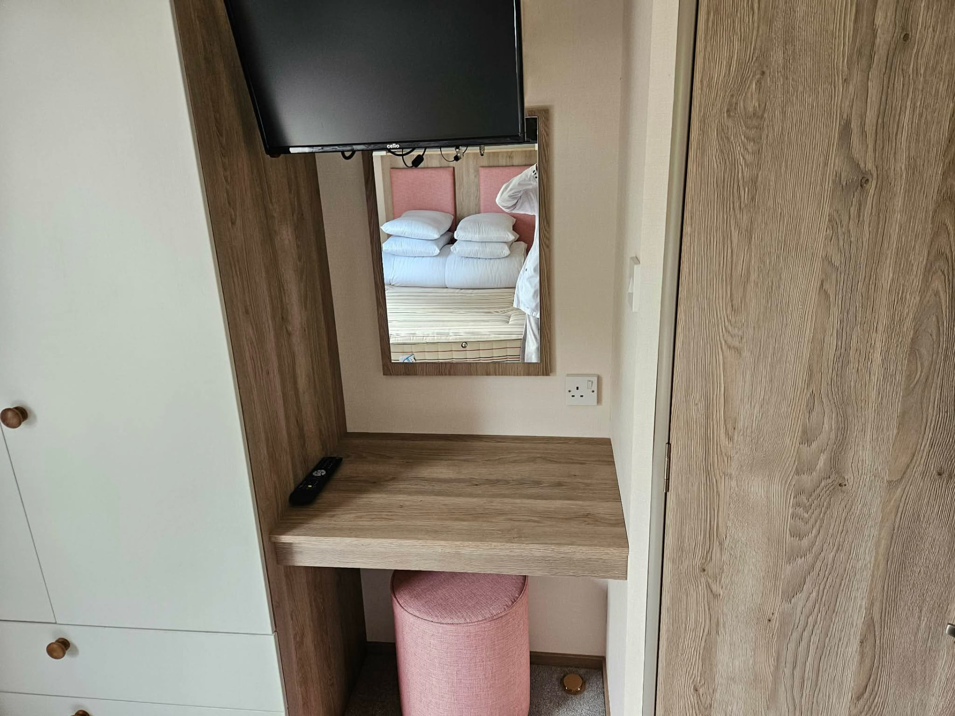 Master bedroom TV & dressing area – 22in TV, mirror and dressing shelf in the master room